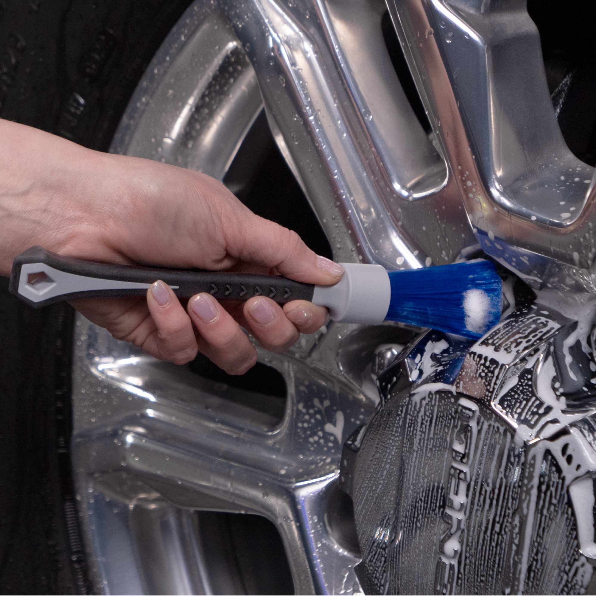 lug nut brush cleaning top of lug nut