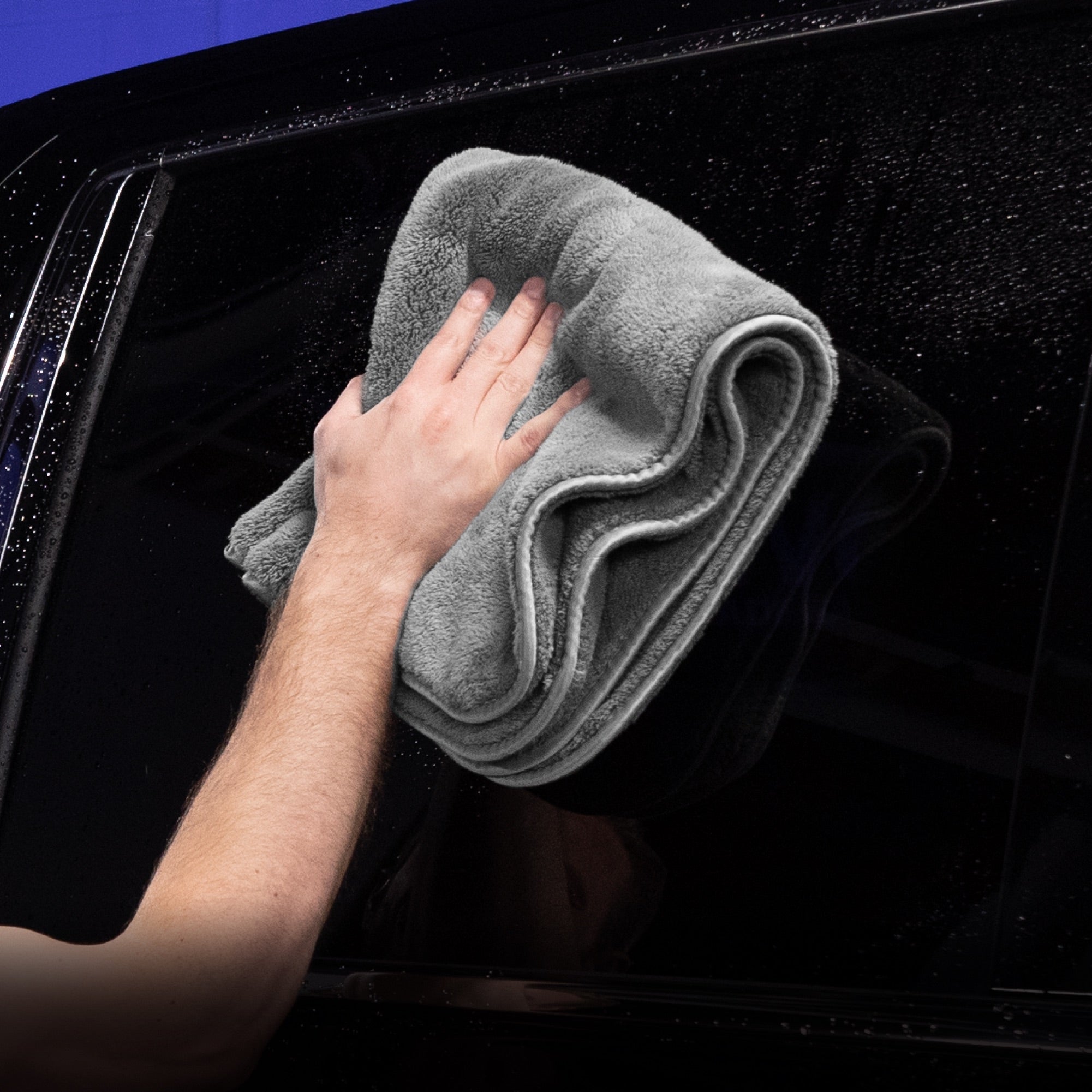 monster drying towel wiping car window