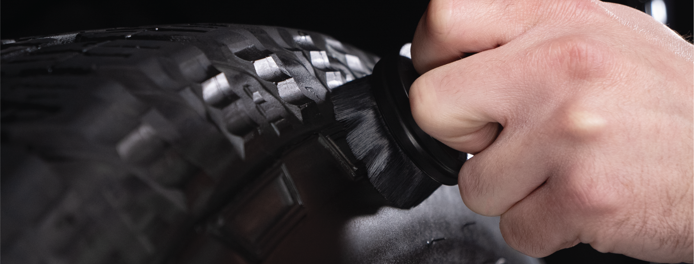 applying tire dressing over raised tire details