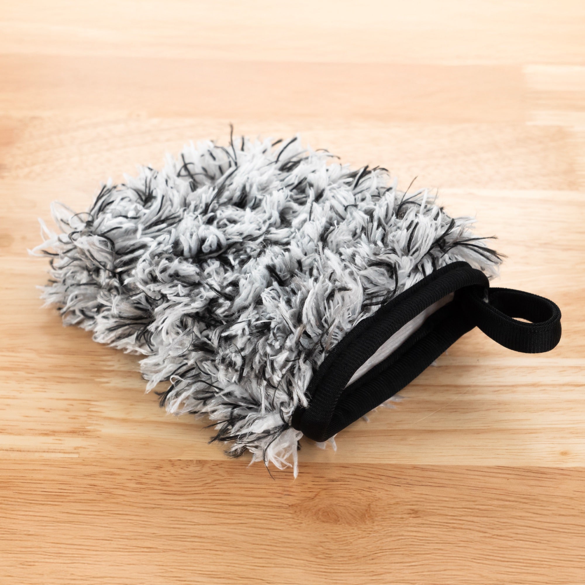 wheel cleaning mitt on table