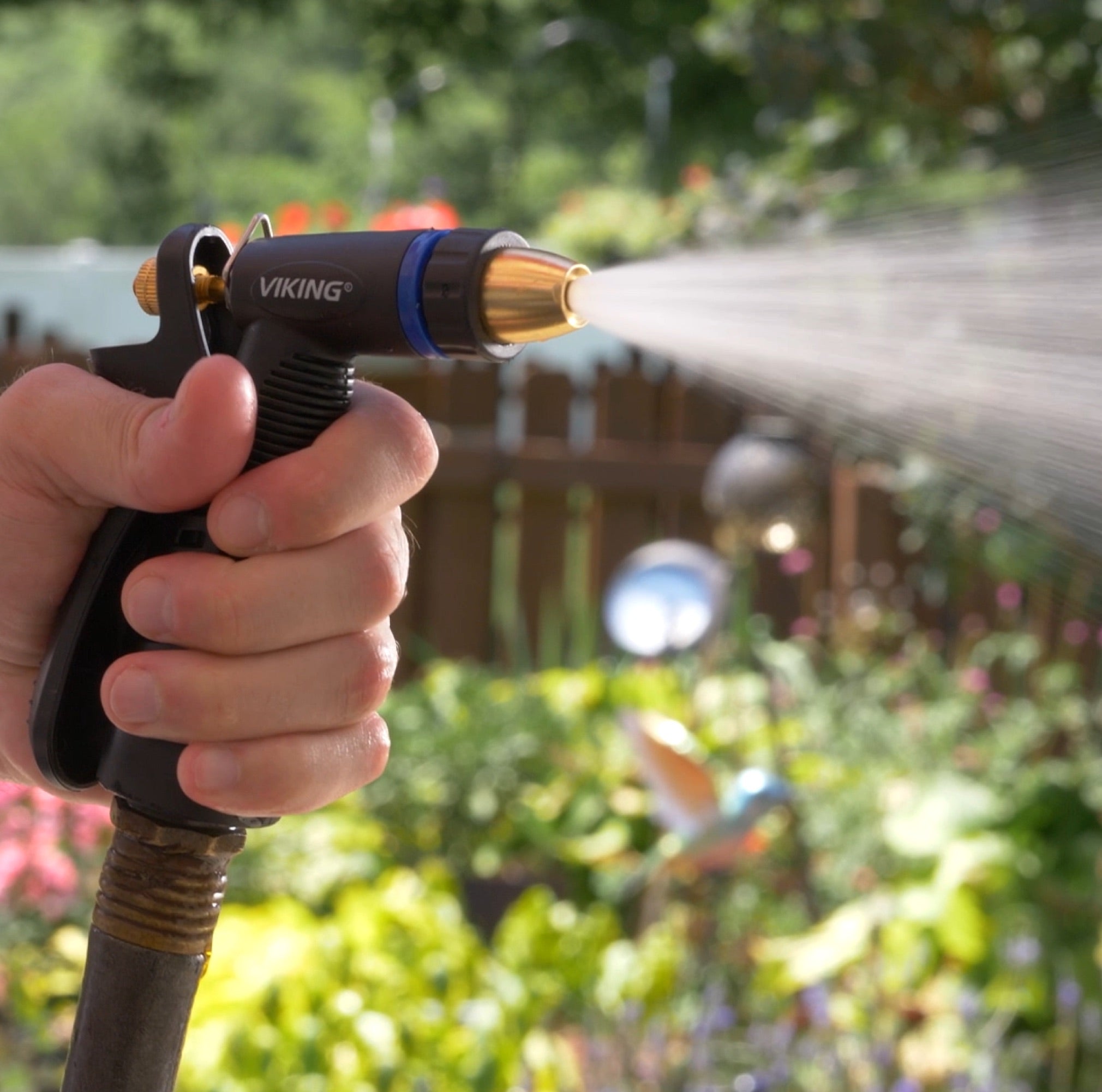 heavy duty spray nozzle spraying in the garden