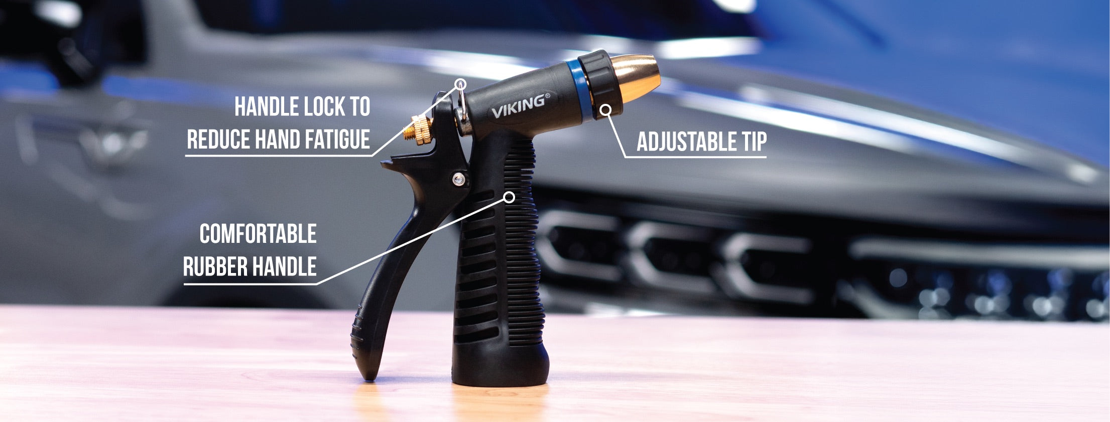 noting several features on the nozzle: handle lock to reduce hand fatigue; comfortable rubber handle; adjustable tip